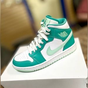 Nike Air Jordan 1 mid women’s 6.5 teal/mint green; authenticated by Flight Club.